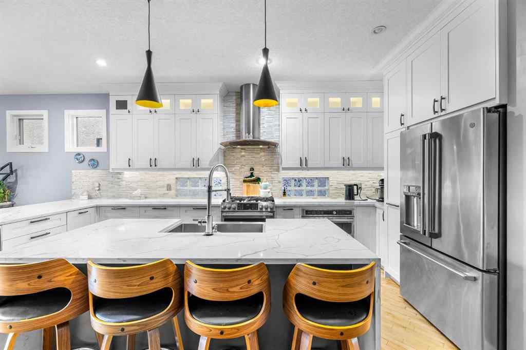 MLS® A2250847 - 2409 7 Avenue NW in West Hillhurst Calgary, Residential