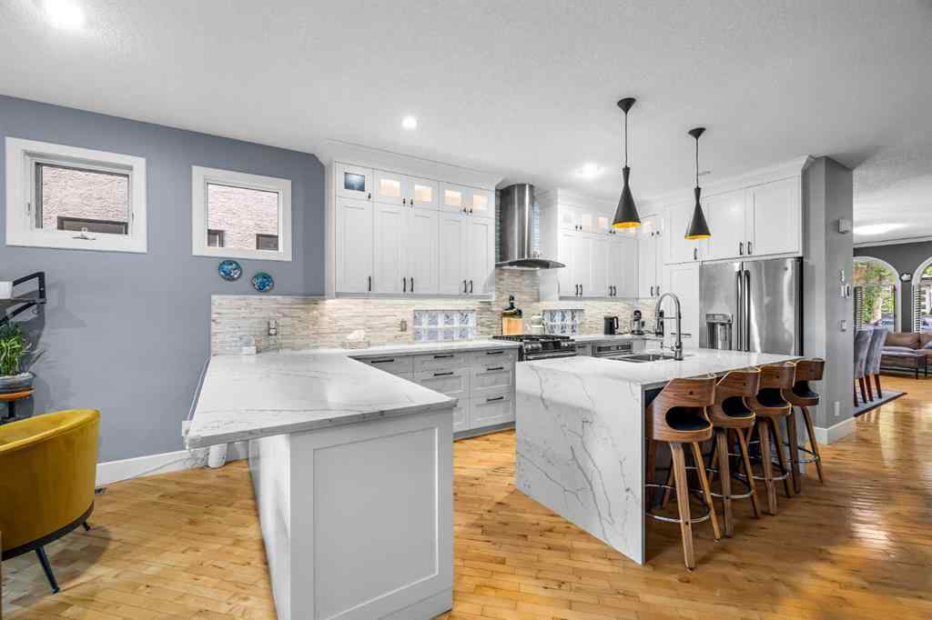 MLS® A2250847 - 2409 7 Avenue NW in West Hillhurst Calgary, Residential