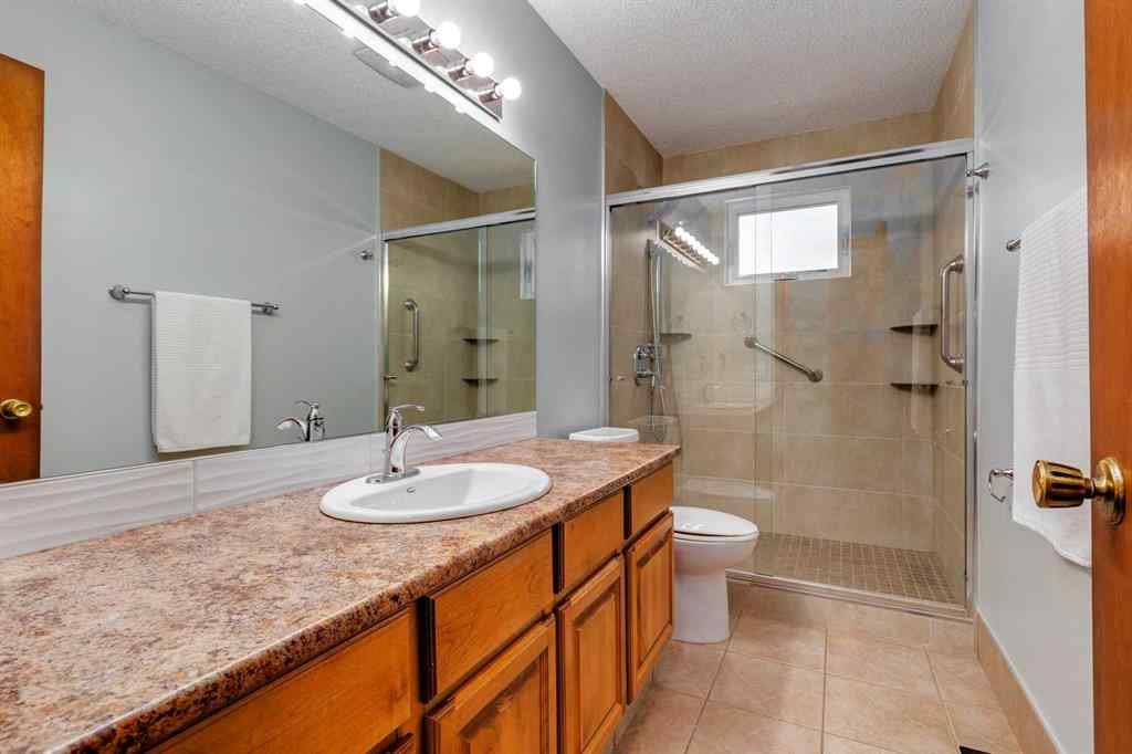 MLS® A2250869 - 103 Macewan Park Road NW in MacEwan Glen Calgary, Residential