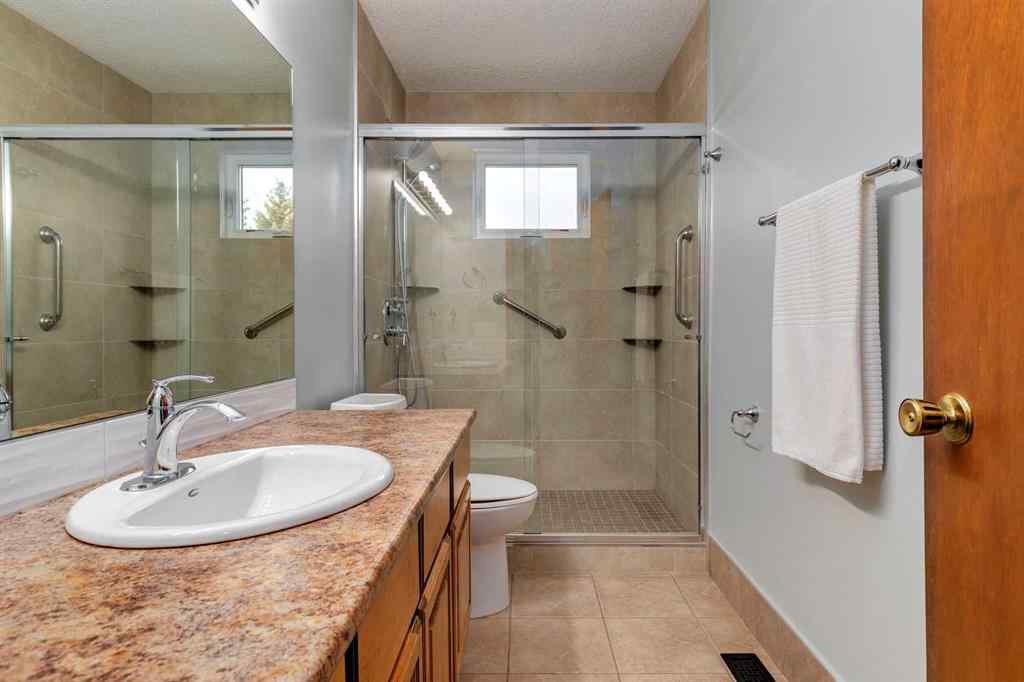 MLS® A2250869 - 103 Macewan Park Road NW in MacEwan Glen Calgary, Residential