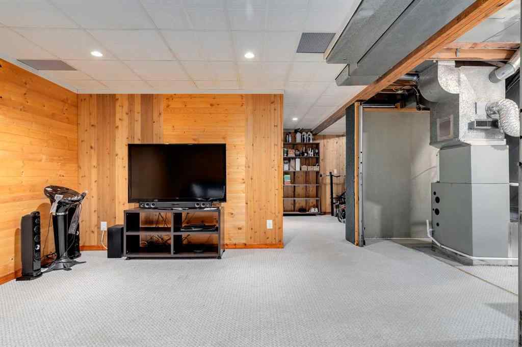 MLS® A2250869 - 103 Macewan Park Road NW in MacEwan Glen Calgary, Residential