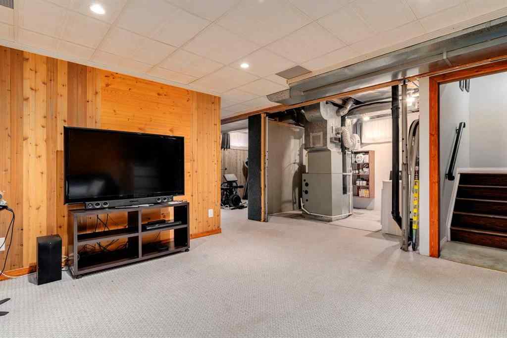 MLS® A2250869 - 103 Macewan Park Road NW in MacEwan Glen Calgary, Residential
