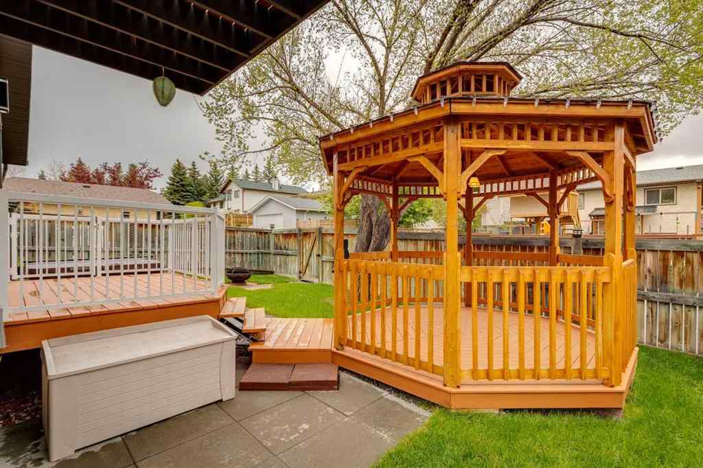 MLS® A2250869 - 103 Macewan Park Road NW in MacEwan Glen Calgary, Residential