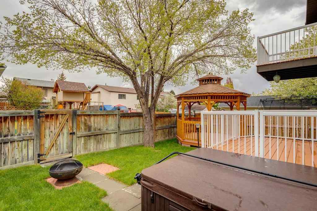 MLS® A2250869 - 103 Macewan Park Road NW in MacEwan Glen Calgary, Residential