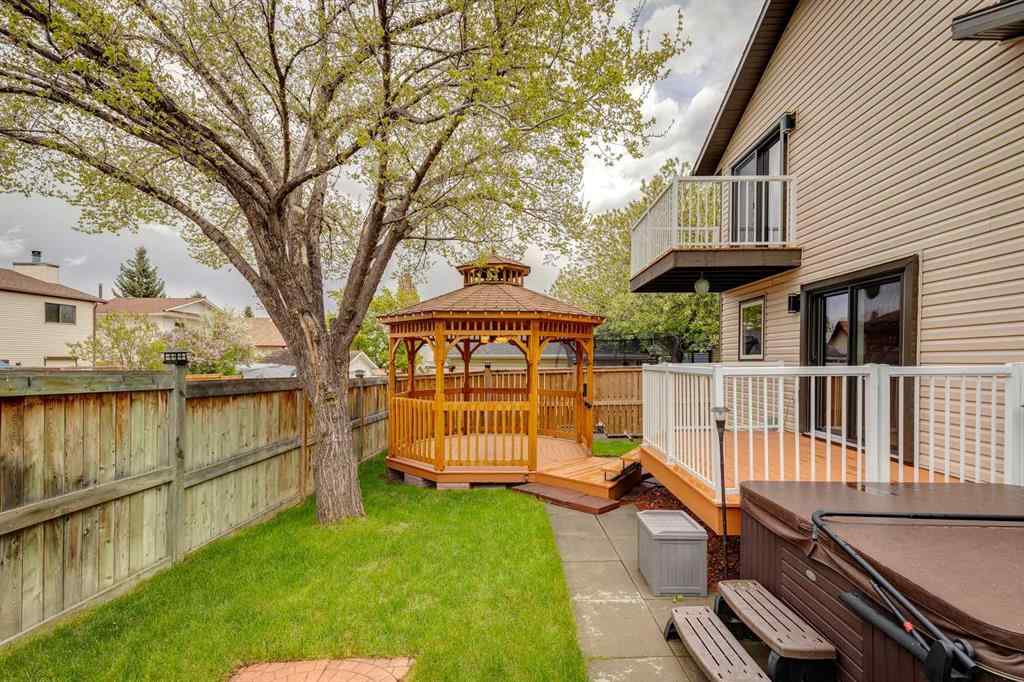 MLS® A2250869 - 103 Macewan Park Road NW in MacEwan Glen Calgary, Residential