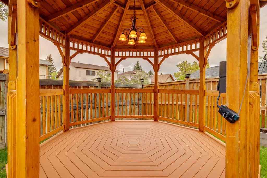 MLS® A2250869 - 103 Macewan Park Road NW in MacEwan Glen Calgary, Residential