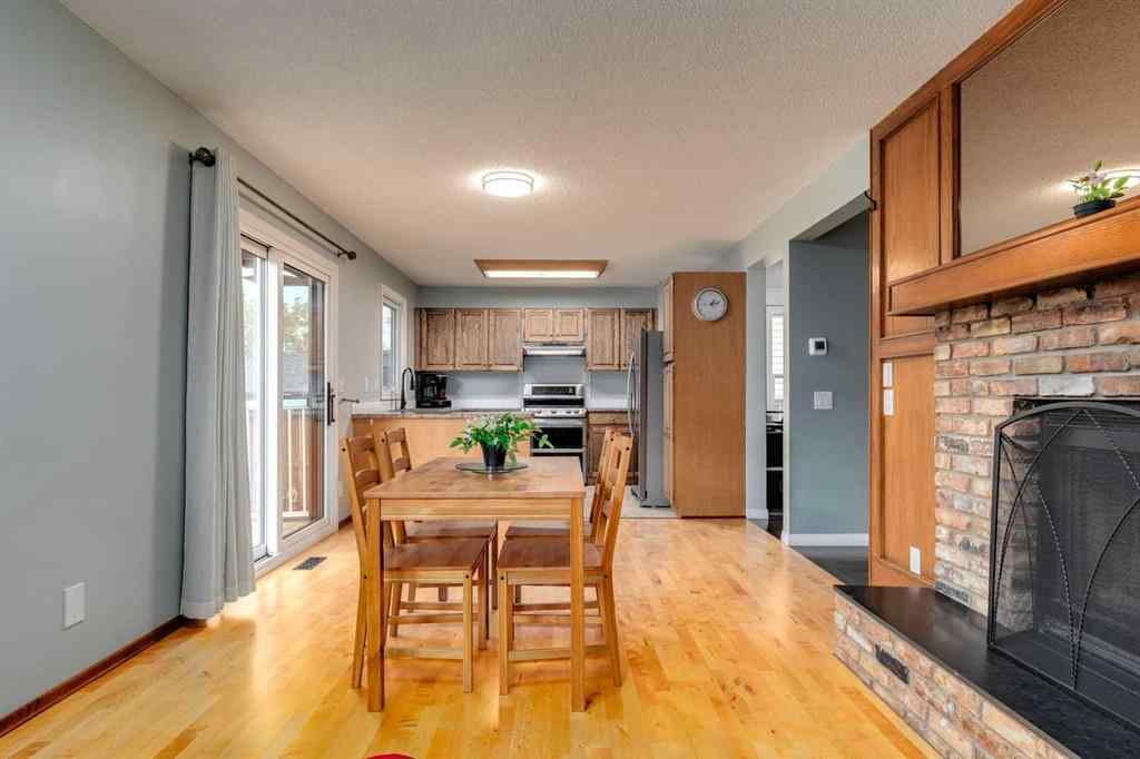 MLS® A2250869 - 103 Macewan Park Road NW in MacEwan Glen Calgary, Residential