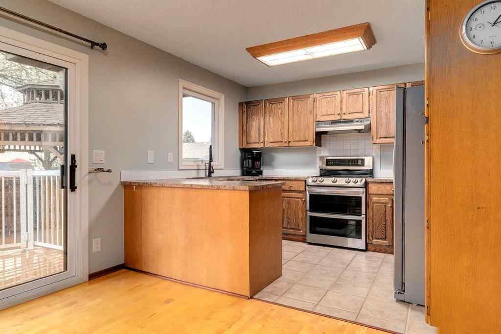 MLS® A2250869 - 103 Macewan Park Road NW in MacEwan Glen Calgary, Residential