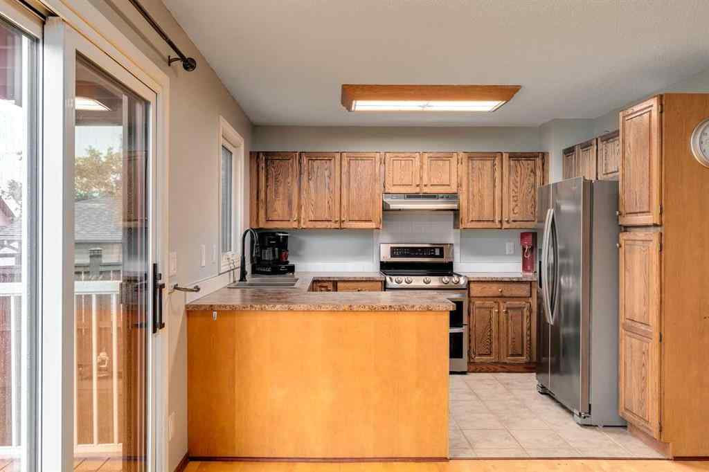MLS® A2250869 - 103 Macewan Park Road NW in MacEwan Glen Calgary, Residential