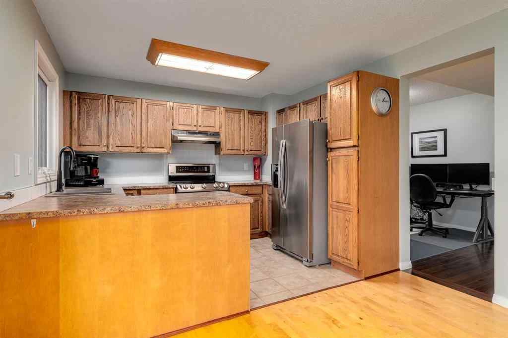 MLS® A2250869 - 103 Macewan Park Road NW in MacEwan Glen Calgary, Residential