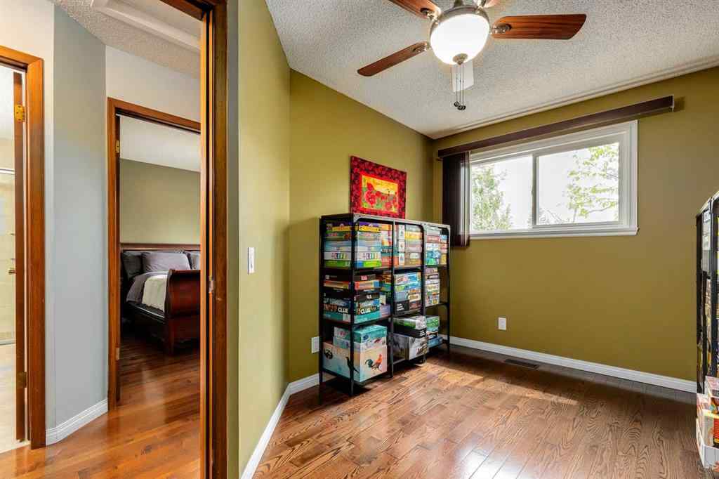 MLS® A2250869 - 103 Macewan Park Road NW in MacEwan Glen Calgary, Residential