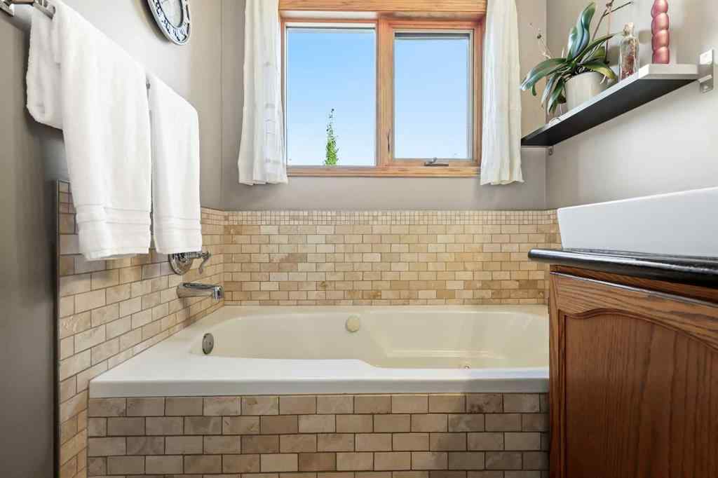 MLS® A2250877 - 49 Sunmeadows Place SE in Sundance Calgary, Residential