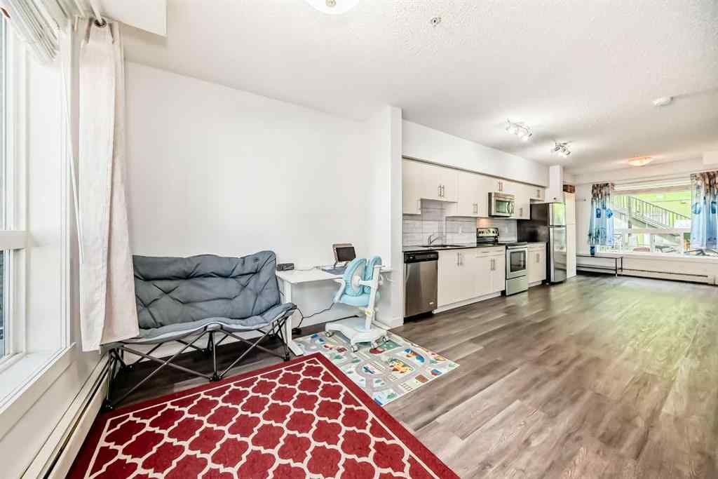 MLS® A2250882 - Unit #106 1740 9 Street NW in Mount Pleasant Calgary, Residential