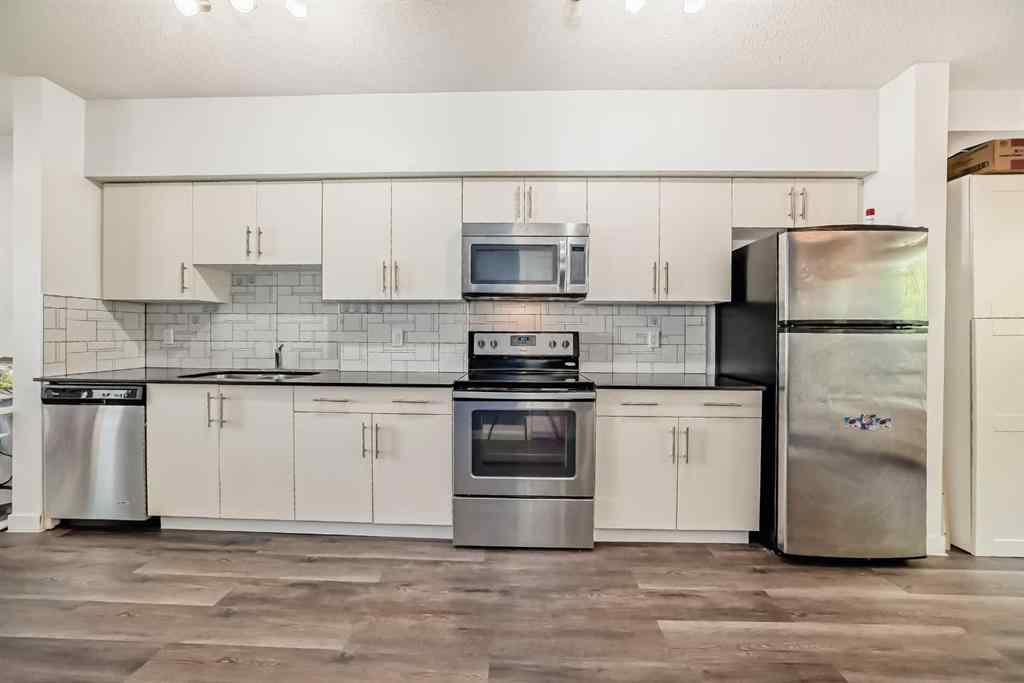MLS® A2250882 - Unit #106 1740 9 Street NW in Mount Pleasant Calgary, Residential