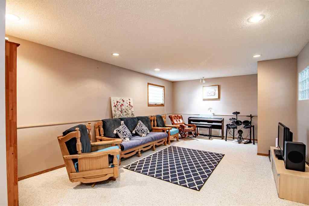 MLS® A2250885 - 22 Doan Avenue  in Deer Park Village Red Deer, Residential