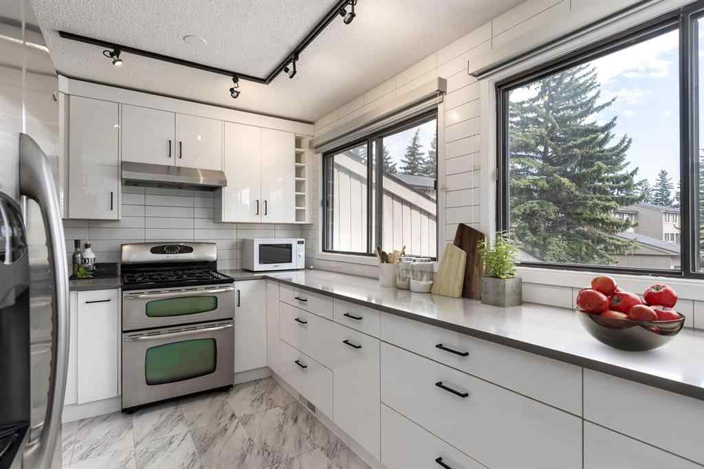 MLS® A2250891 - Unit #40 10401 19 Street SW in Braeside Calgary, Residential