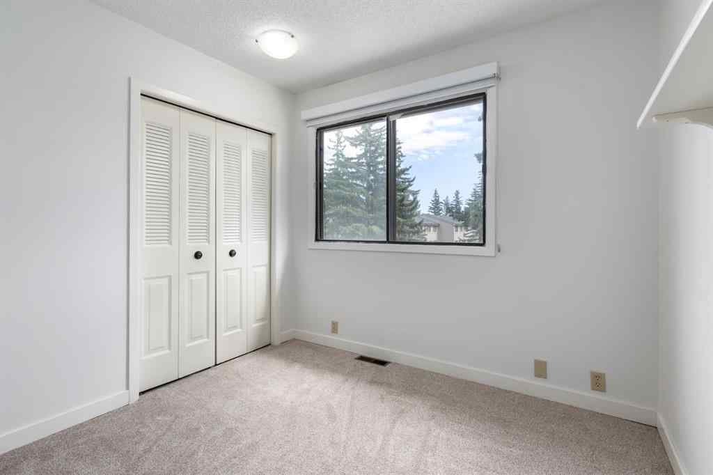MLS® A2250891 - Unit #40 10401 19 Street SW in Braeside Calgary, Residential