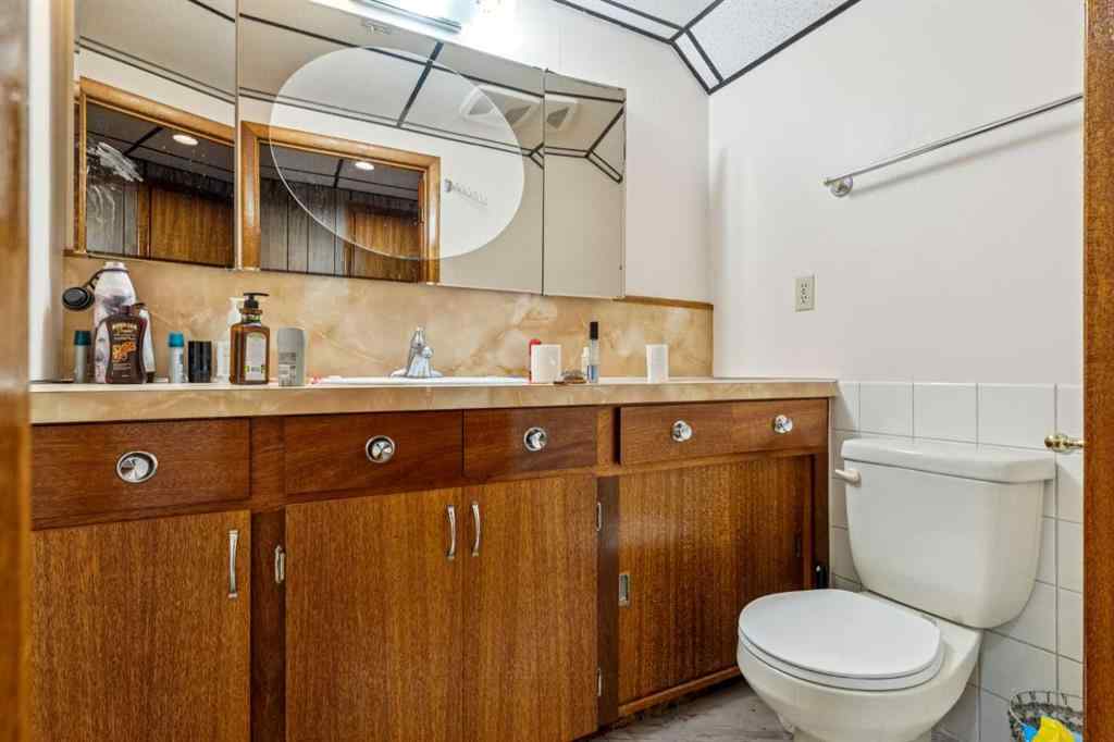 MLS® A2250914 - 233 27 Avenue NE in Tuxedo Park Calgary, Residential