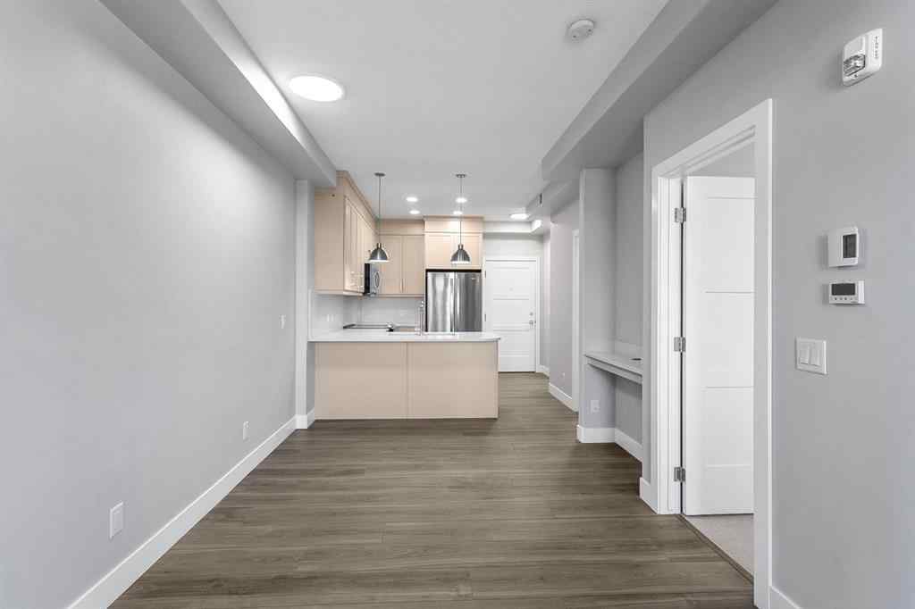MLS® A2250943 - Unit #416 8355 19 Avenue SW in Springbank Hill Calgary, Residential