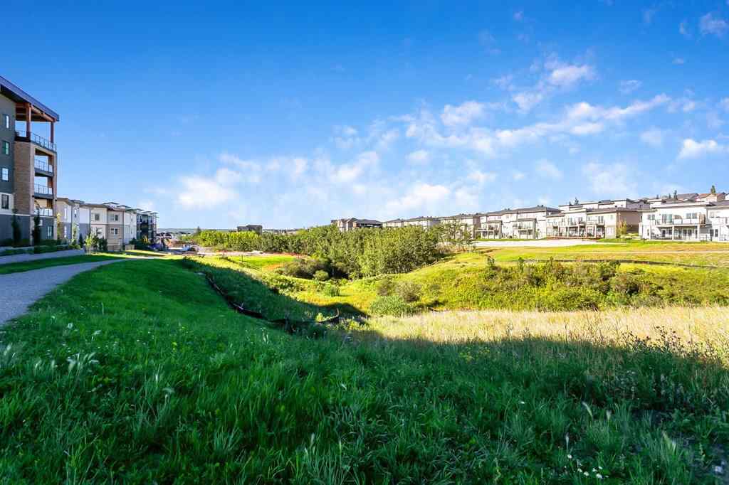MLS® A2250943 - Unit #416 8355 19 Avenue SW in Springbank Hill Calgary, Residential