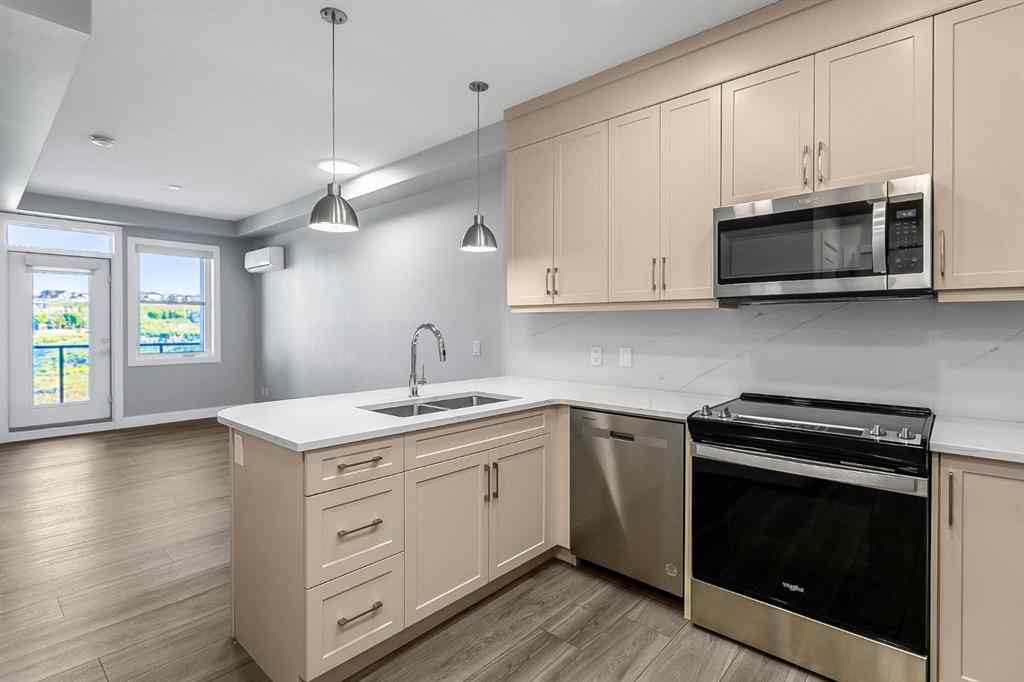 MLS® A2250943 - Unit #416 8355 19 Avenue SW in Springbank Hill Calgary, Residential