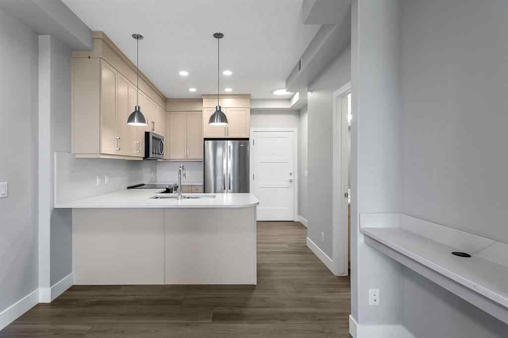 MLS® A2250943 - Unit #416 8355 19 Avenue SW in Springbank Hill Calgary, Residential