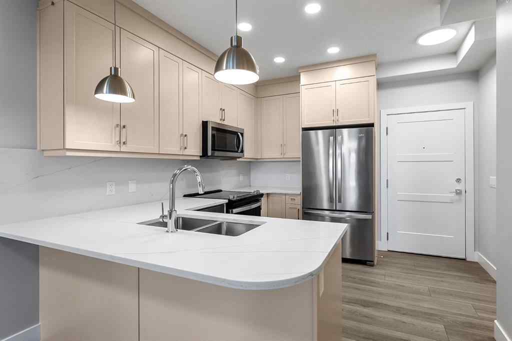 MLS® A2250943 - Unit #416 8355 19 Avenue SW in Springbank Hill Calgary, Residential