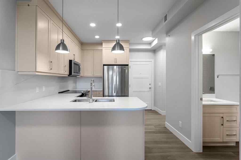 MLS® A2250943 - Unit #416 8355 19 Avenue SW in Springbank Hill Calgary, Residential