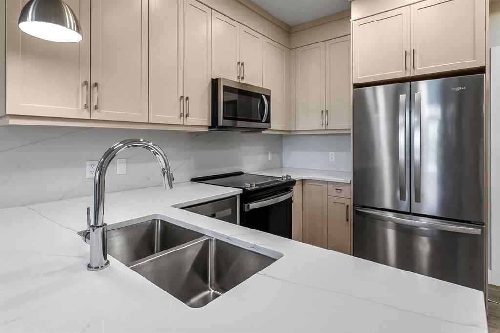 MLS® A2250943 - Unit #416 8355 19 Avenue SW in Springbank Hill Calgary, Residential