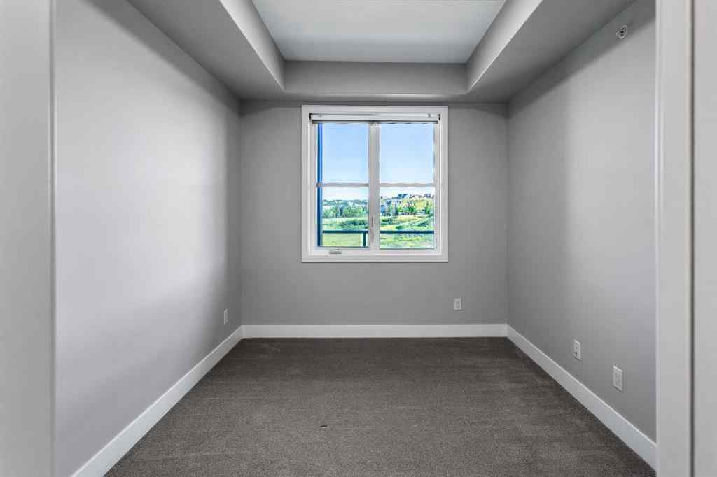 MLS® A2250943 - Unit #416 8355 19 Avenue SW in Springbank Hill Calgary, Residential