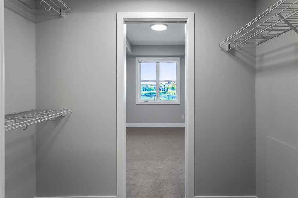 MLS® A2250943 - Unit #416 8355 19 Avenue SW in Springbank Hill Calgary, Residential