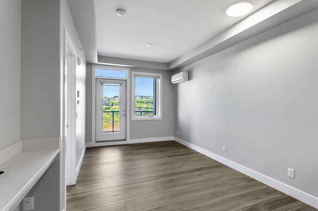 MLS® A2250943 - Unit #416 8355 19 Avenue SW in Springbank Hill Calgary, Residential