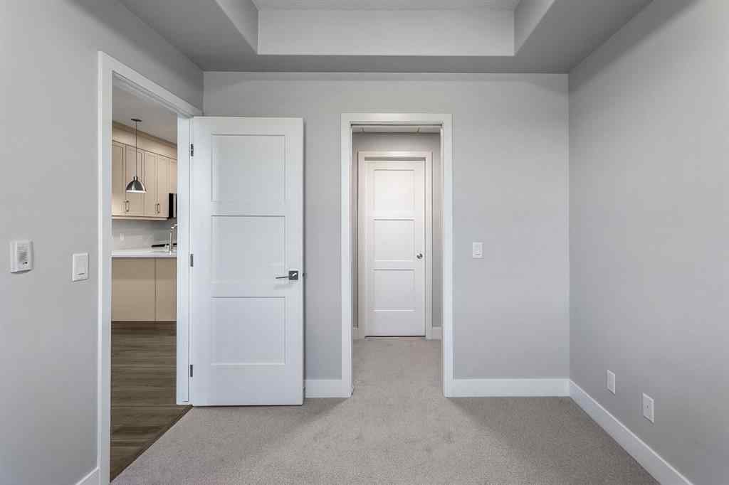 MLS® A2250943 - Unit #416 8355 19 Avenue SW in Springbank Hill Calgary, Residential