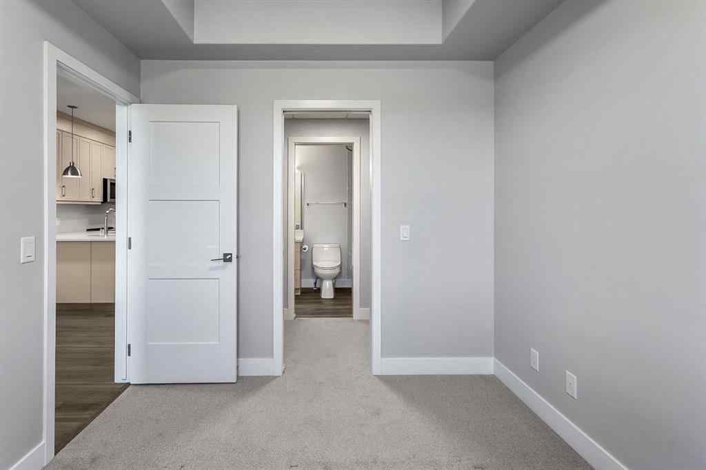MLS® A2250943 - Unit #416 8355 19 Avenue SW in Springbank Hill Calgary, Residential