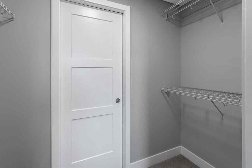 MLS® A2250943 - Unit #416 8355 19 Avenue SW in Springbank Hill Calgary, Residential