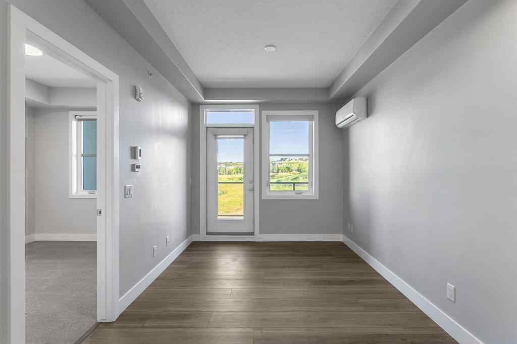 MLS® A2250943 - Unit #416 8355 19 Avenue SW in Springbank Hill Calgary, Residential