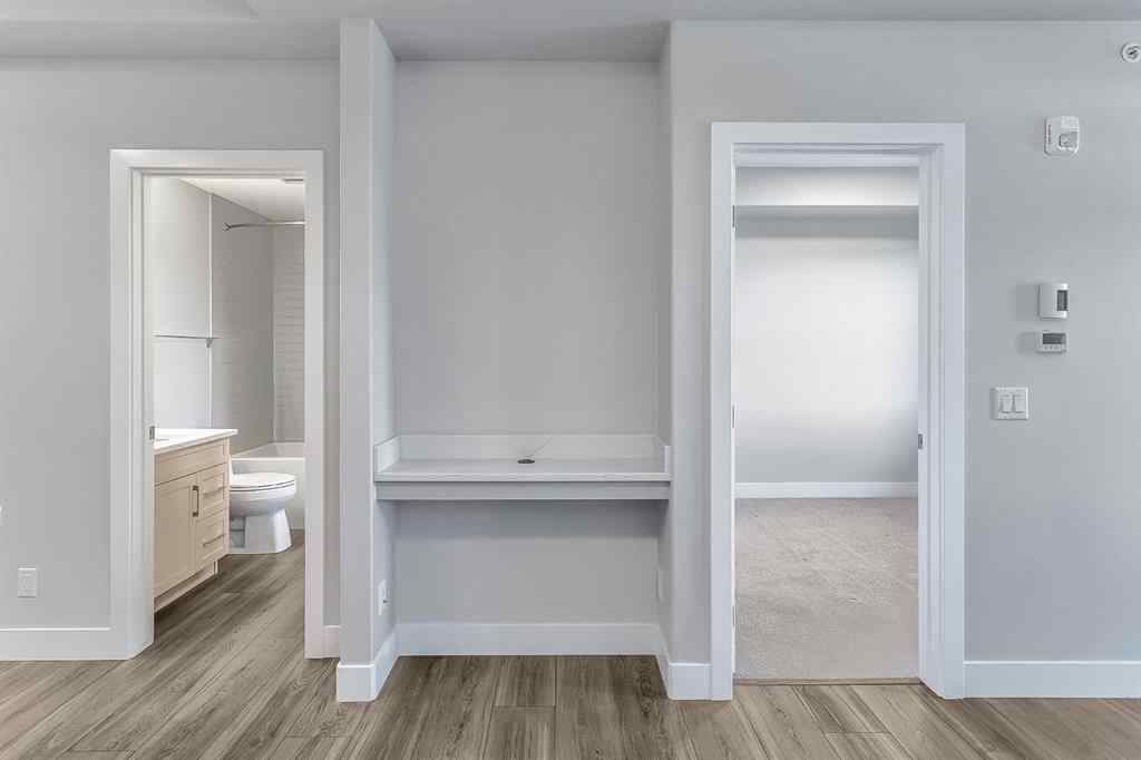 MLS® A2250943 - Unit #416 8355 19 Avenue SW in Springbank Hill Calgary, Residential