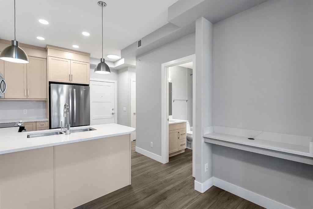 MLS® A2250943 - Unit #416 8355 19 Avenue SW in Springbank Hill Calgary, Residential