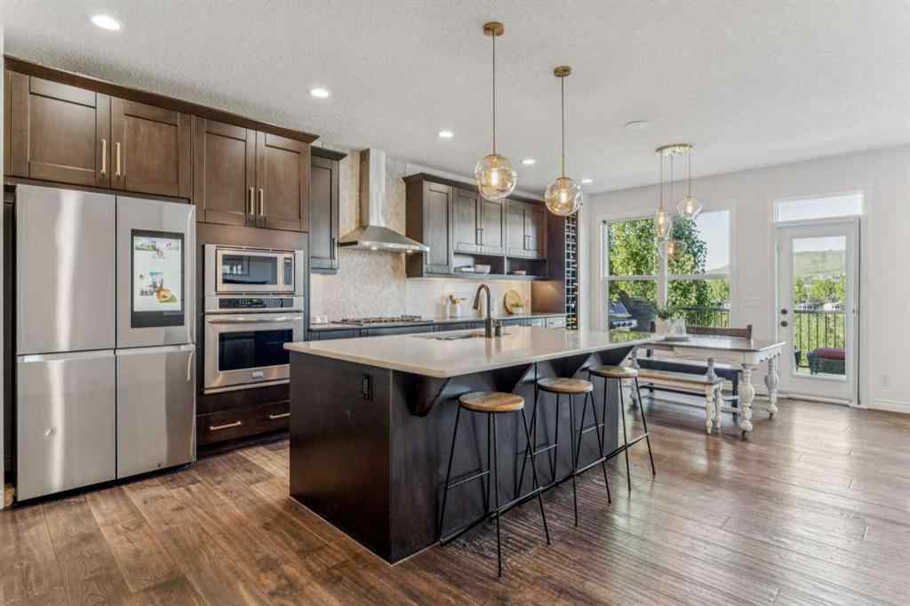MLS® A2250965 - 50 Riviera View  in Riviera Cochrane, Residential