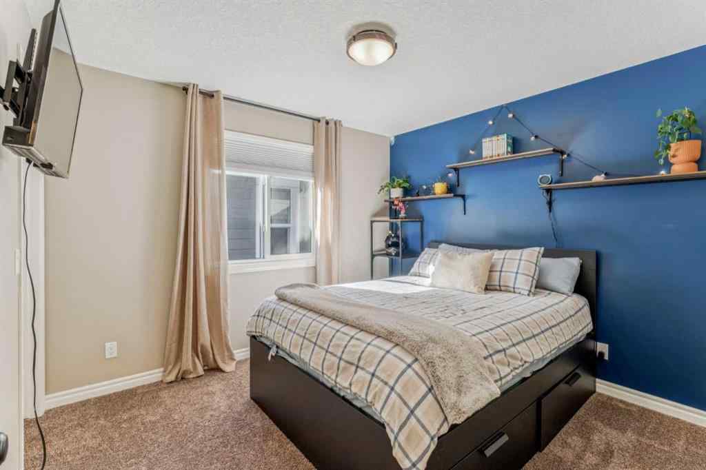 MLS® A2250965 - 50 Riviera View  in Riviera Cochrane, Residential