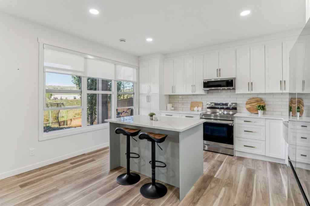 MLS® A2250965 - 50 Riviera View  in Riviera Cochrane, Residential