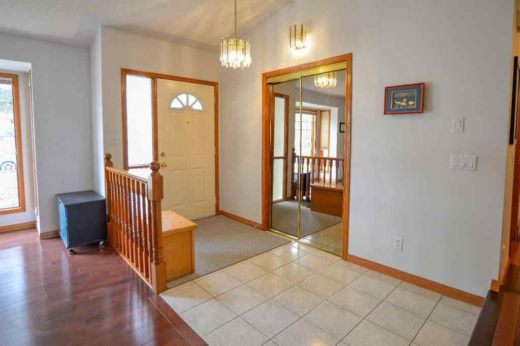 MLS® A2250966 - 393 Hawktree Circle NW in Hawkwood Calgary, Residential