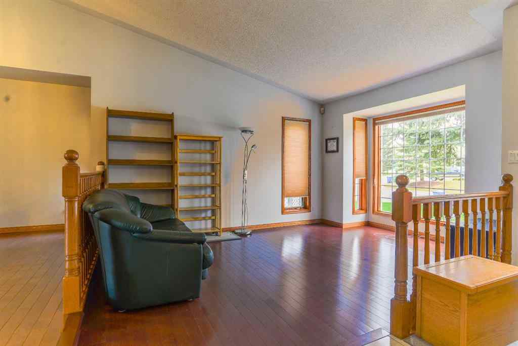 MLS® A2250966 - 393 Hawktree Circle NW in Hawkwood Calgary, Residential