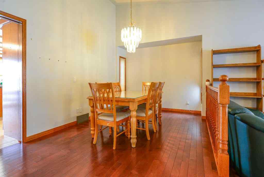 MLS® A2250966 - 393 Hawktree Circle NW in Hawkwood Calgary, Residential