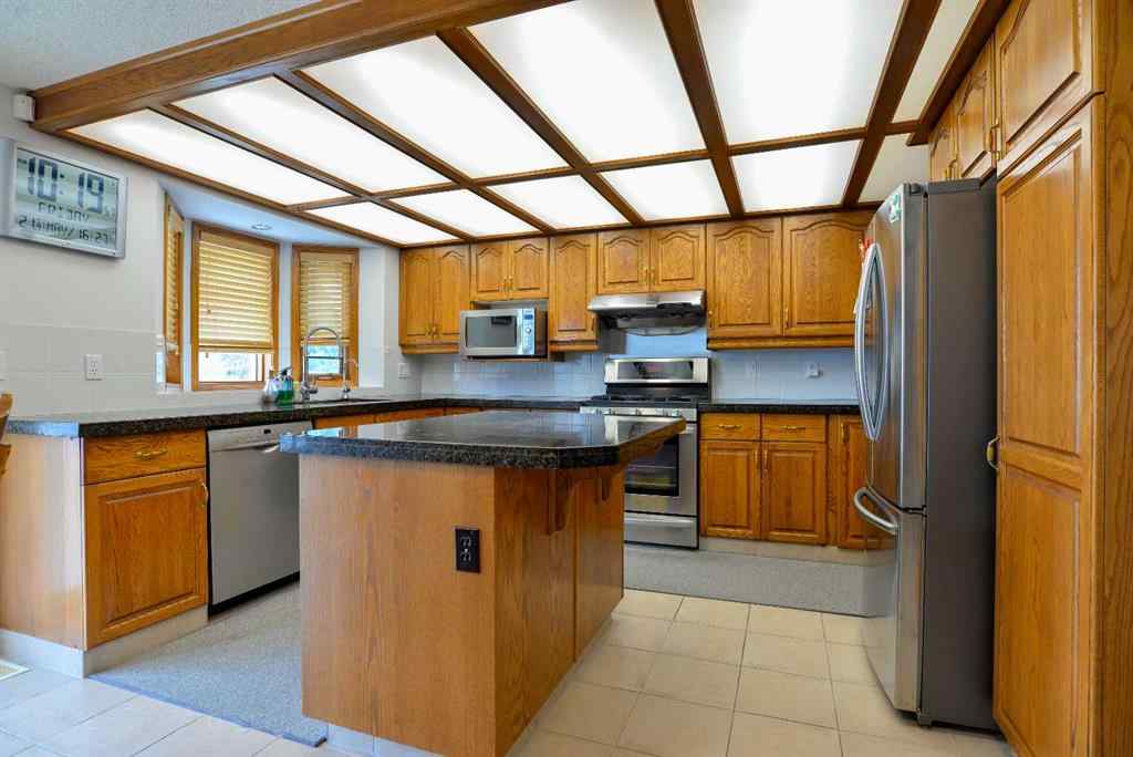 MLS® A2250966 - 393 Hawktree Circle NW in Hawkwood Calgary, Residential
