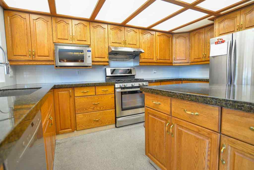 MLS® A2250966 - 393 Hawktree Circle NW in Hawkwood Calgary, Residential