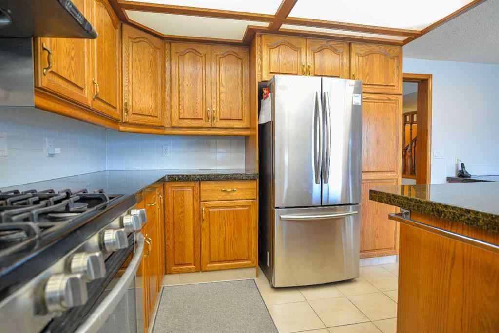 MLS® A2250966 - 393 Hawktree Circle NW in Hawkwood Calgary, Residential
