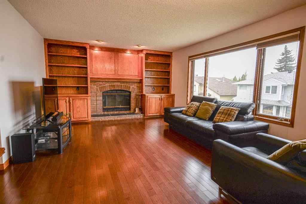 MLS® A2250966 - 393 Hawktree Circle NW in Hawkwood Calgary, Residential