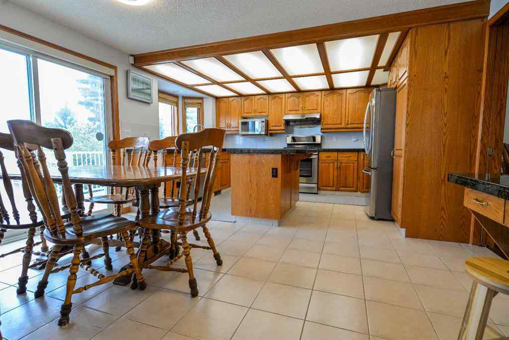 MLS® A2250966 - 393 Hawktree Circle NW in Hawkwood Calgary, Residential