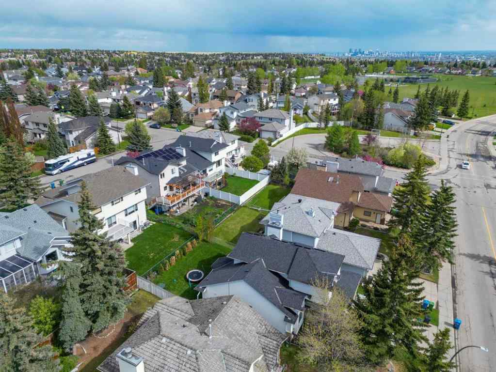MLS® A2250966 - 393 Hawktree Circle NW in Hawkwood Calgary, Residential